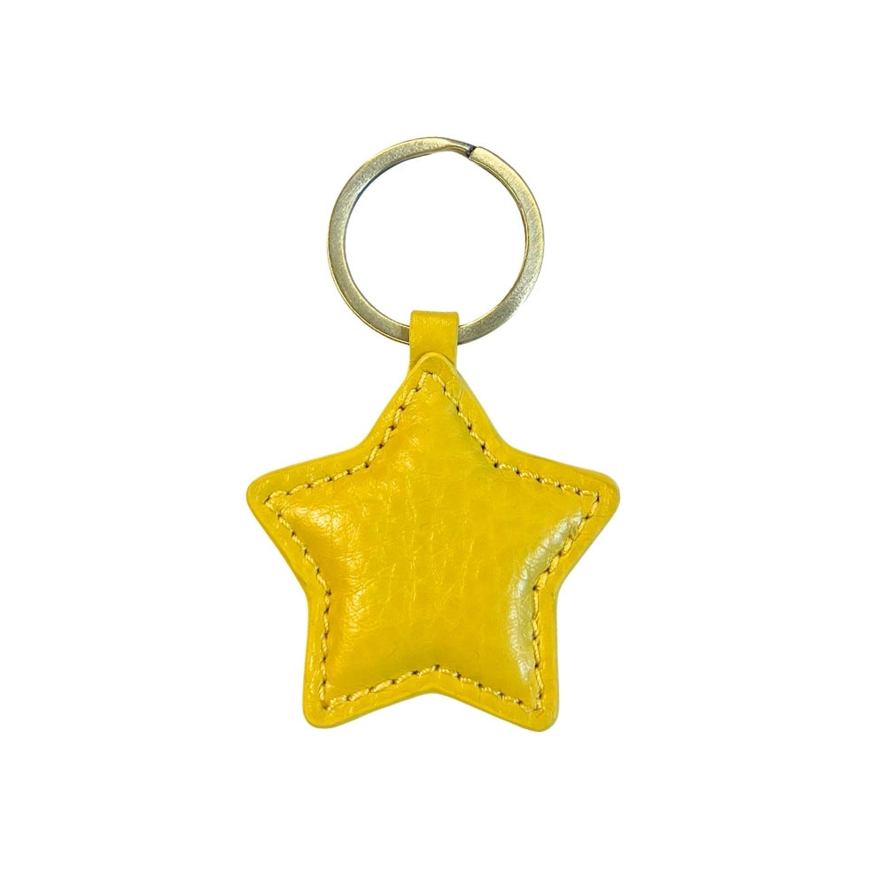 Schlüsselanhänger in Sternform in Mango gelb